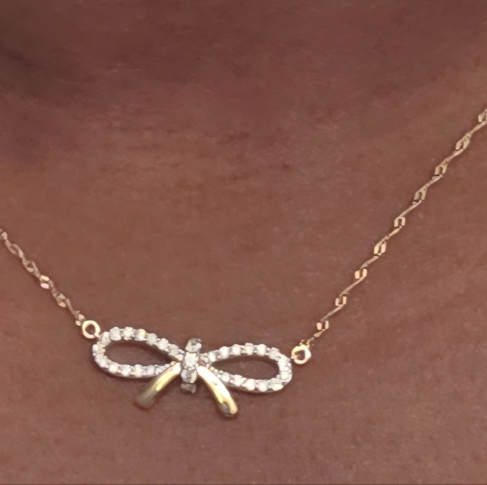 White Diamond 10k Yellow Gold Bow Necklace 0.35ctw